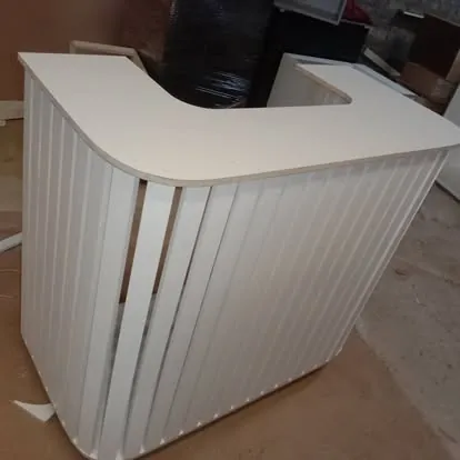 Curved white reception desk