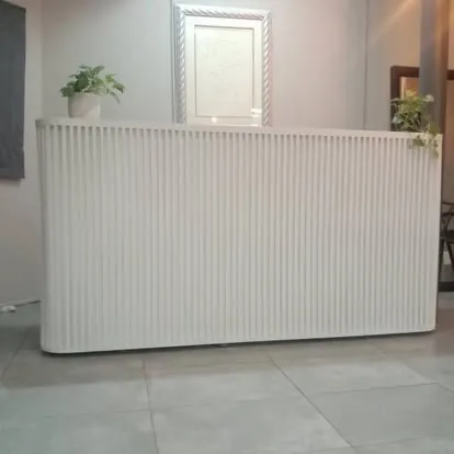 White fluted reception counter