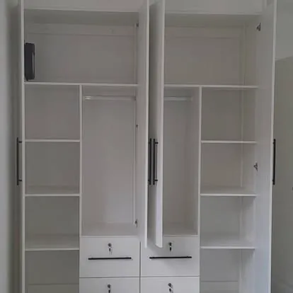 Open wardrobe interior with shelves